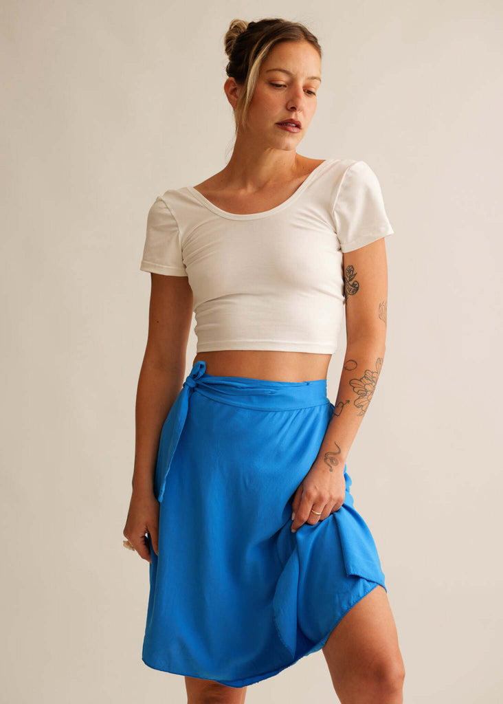 Alis Cosmic Skirt — Blue wrap skirt and white top on model — MYFASHIONFRUIT