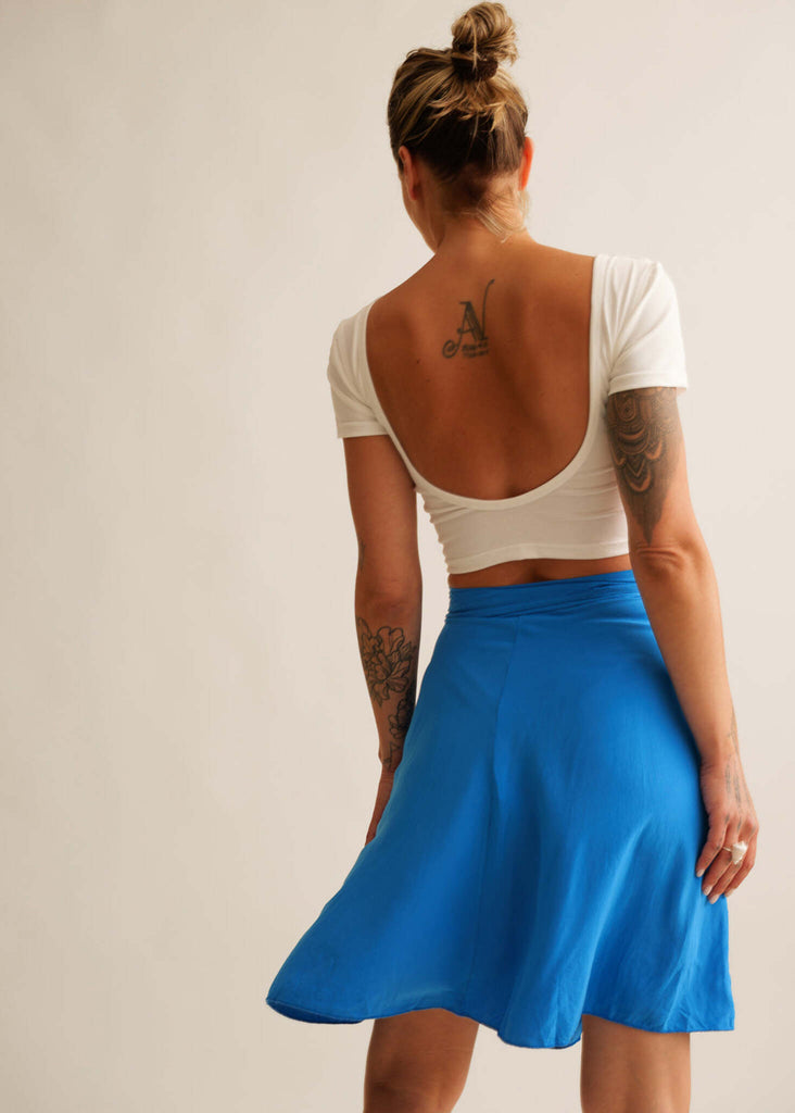 Alis Cosmic Skirt — Blue mini skirt on model with white top — MYFASHIONFRUIT