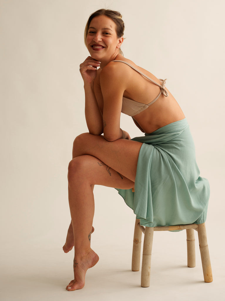 Alis Lagoon Skirt — Woman in mint green skirt & beige top, on model — MYFASHIONFRUIT