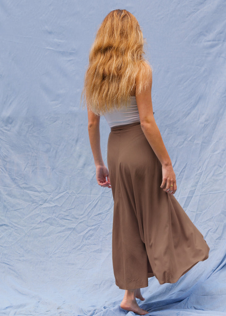 Alanis Mocha Skirt — Brown skirt on model, back view — MYFASHIONFRUIT