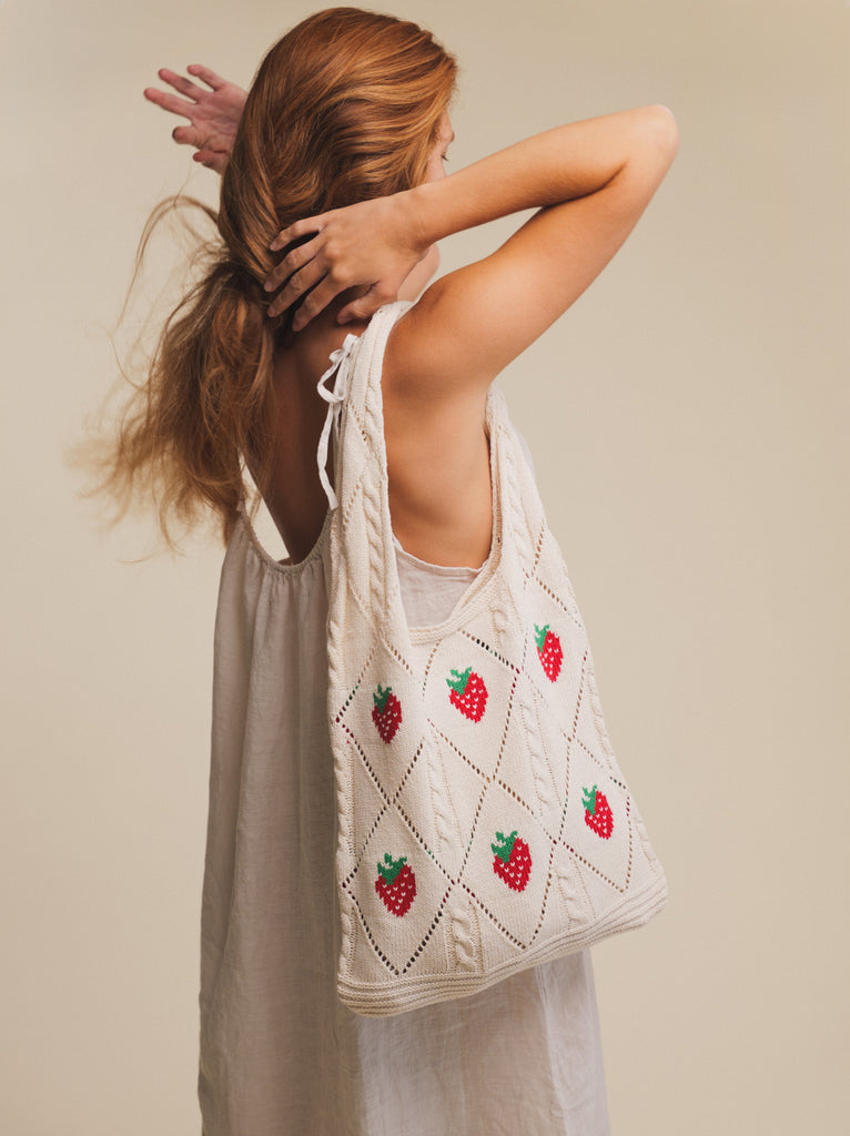 Fraise Crochet Bag — Cream bag with strawberries on model — MYFASHIONFRUIT