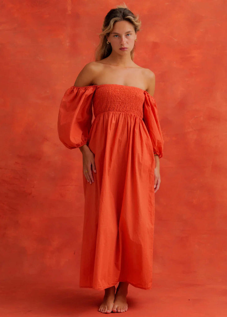 Paloma Dress — Orange off-shoulder dress on model — MYFASHIONFRUIT