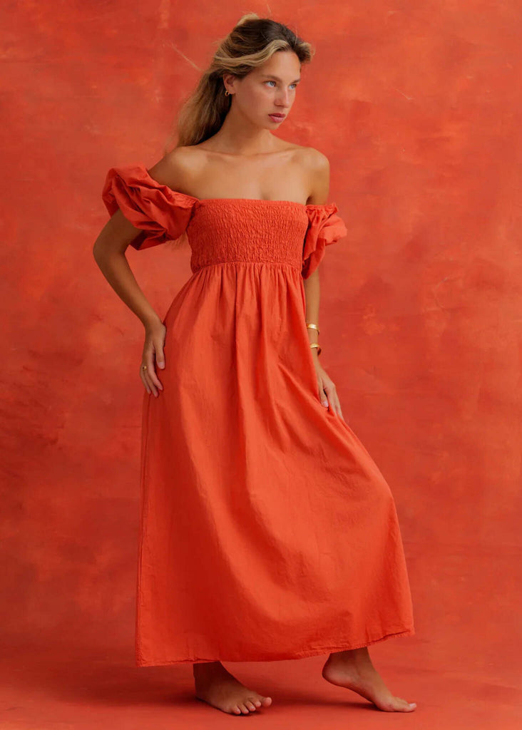 Paloma Dress — Orange off-shoulder dress on model — MYFASHIONFRUIT