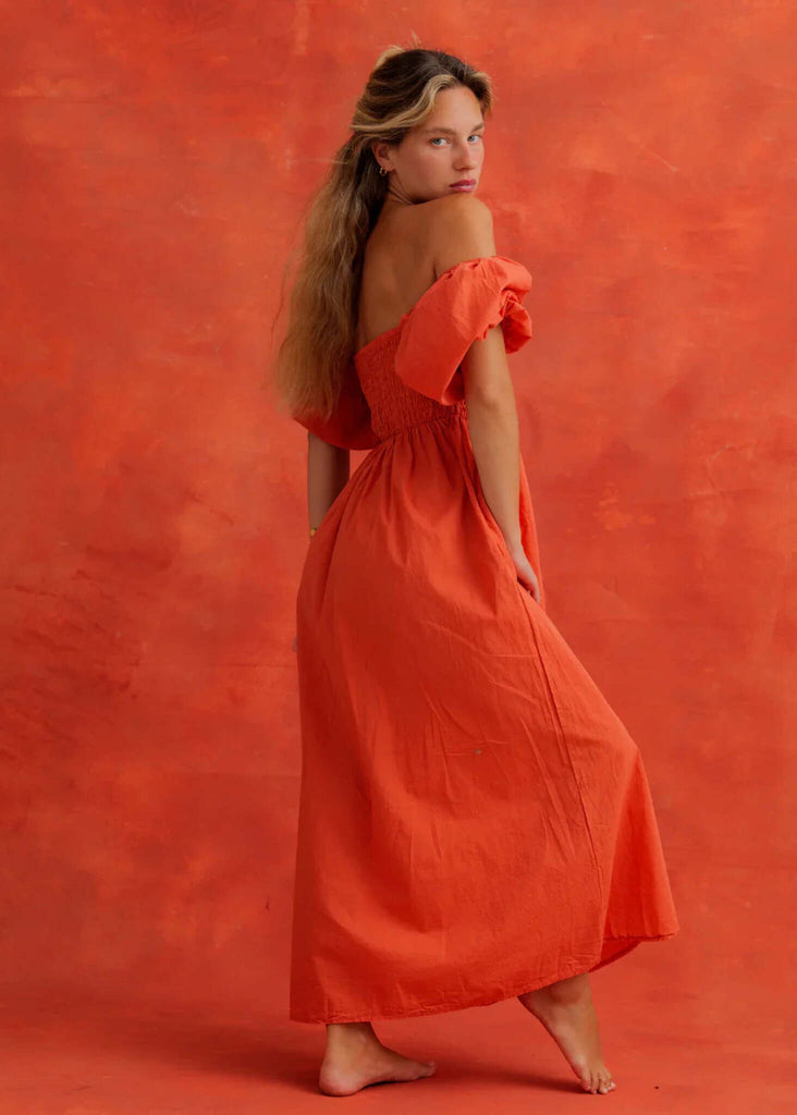 Paloma Dress — Orange off-shoulder dress on model — MYFASHIONFRUIT