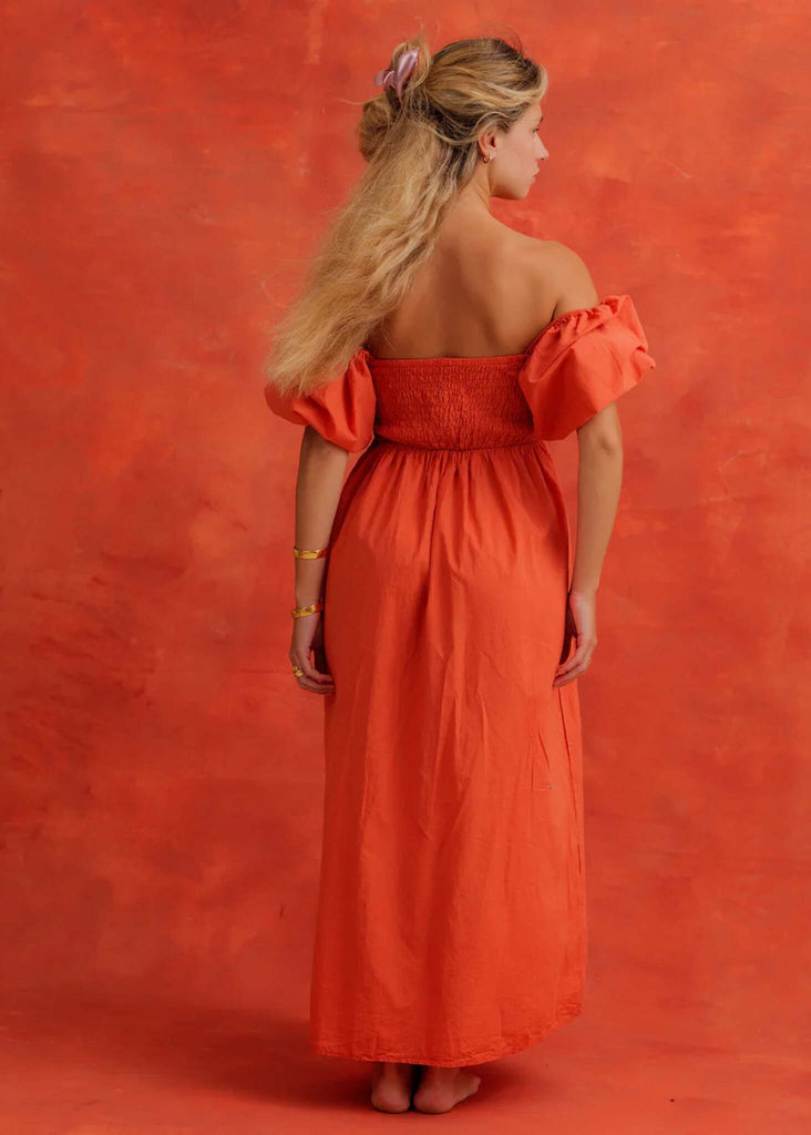 Paloma Dress — Orange off-shoulder dress on model — MYFASHIONFRUIT