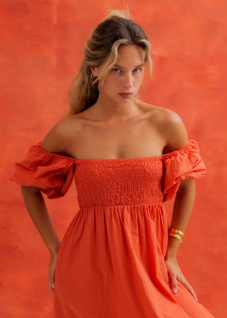 Paloma Dress — Off-shoulder burnt orange dress on model — MYFASHIONFRUIT