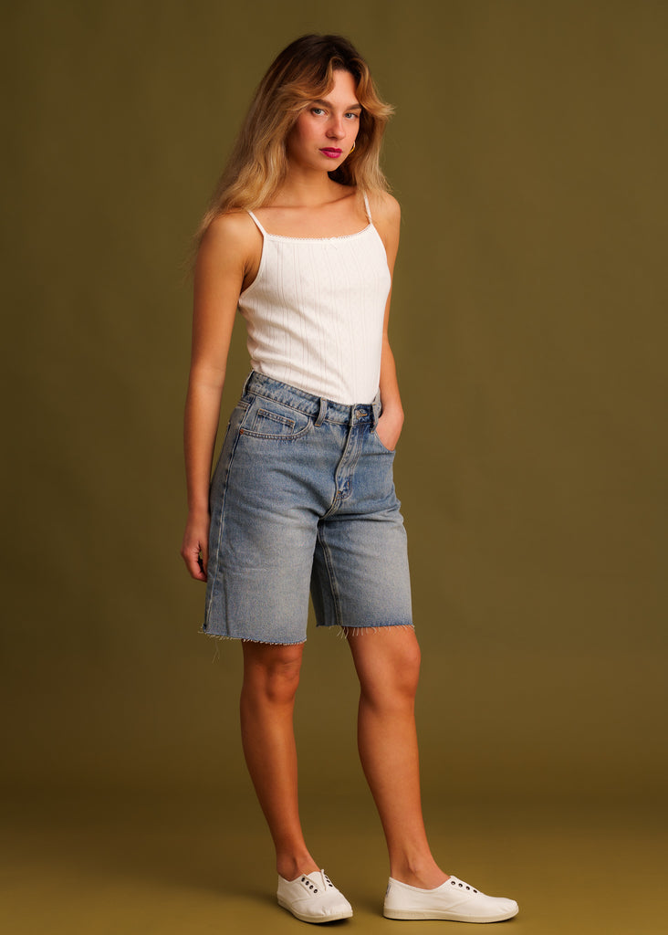 Victus Short Bermuda — Light wash denim shorts on model — MYFASHIONFRUIT