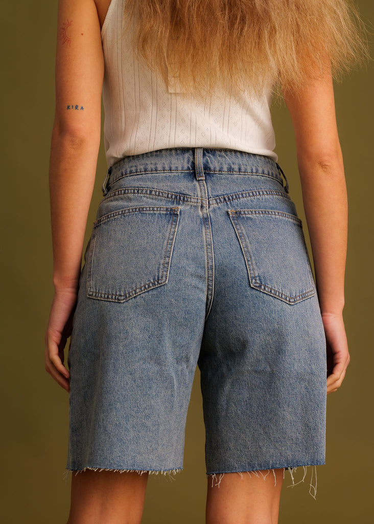 Victus Short Bermuda — light blue denim shorts on model, back view — MYFASHIONFRUIT