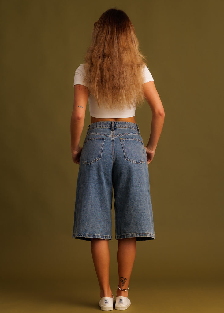Ricki Bermuda — Light blue, wide leg denim shorts on model — MYFASHIONFRUIT