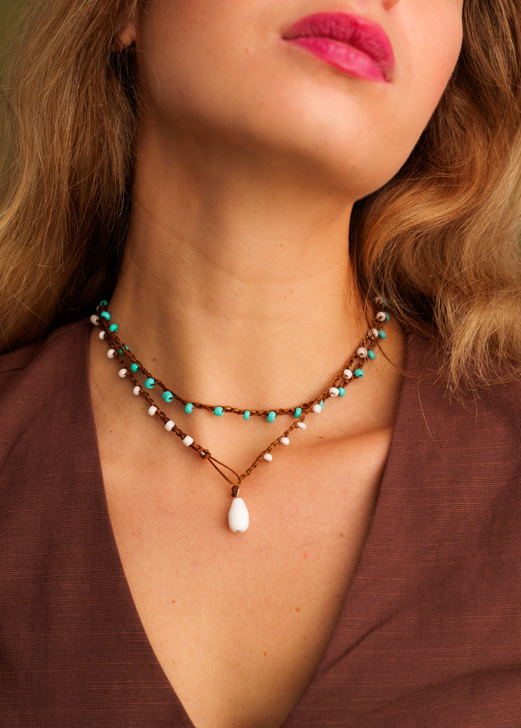 Nirvana Necklet — Brown cord necklace with white and turquoise beads on model — MYFASHIONFRUIT