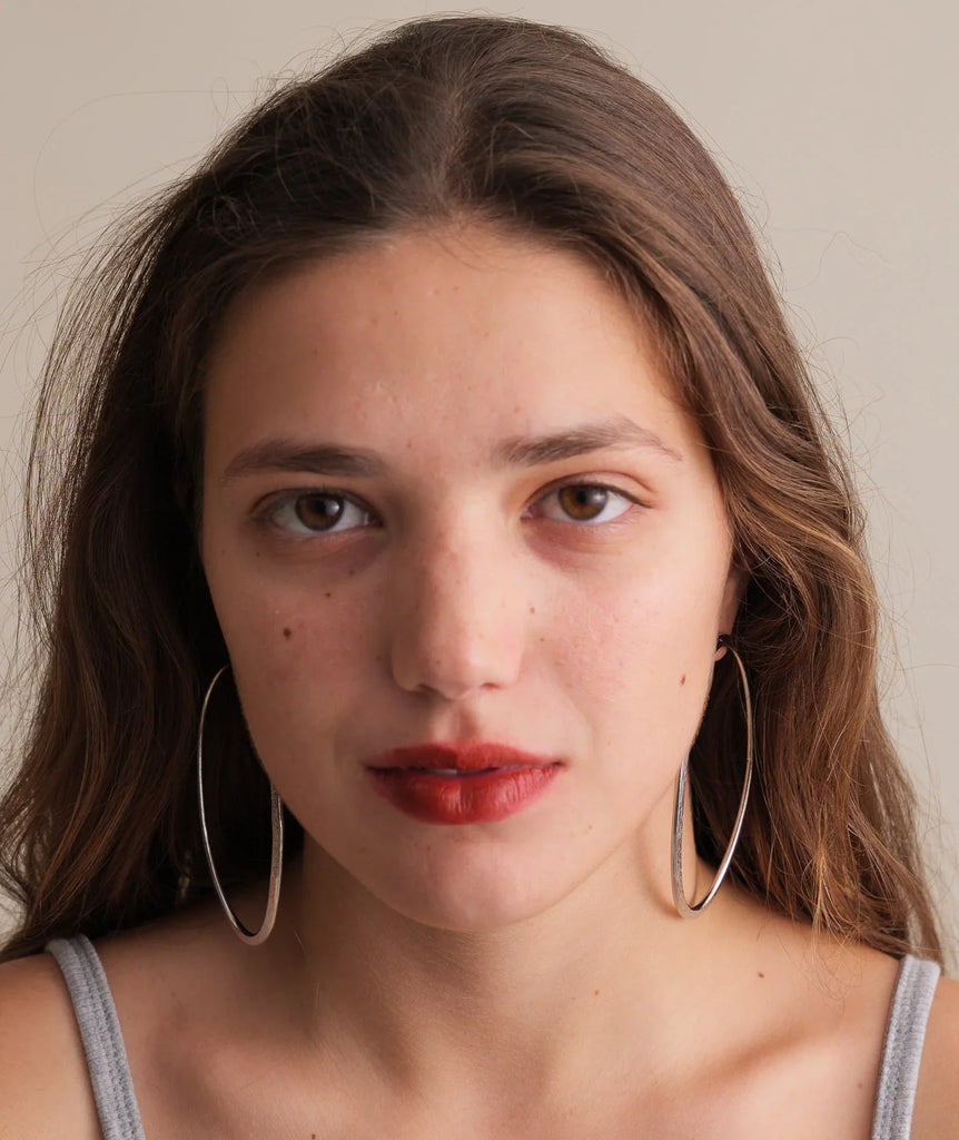 Ivee Earrings — Silver hoops on model — MYFASHIONFRUIT