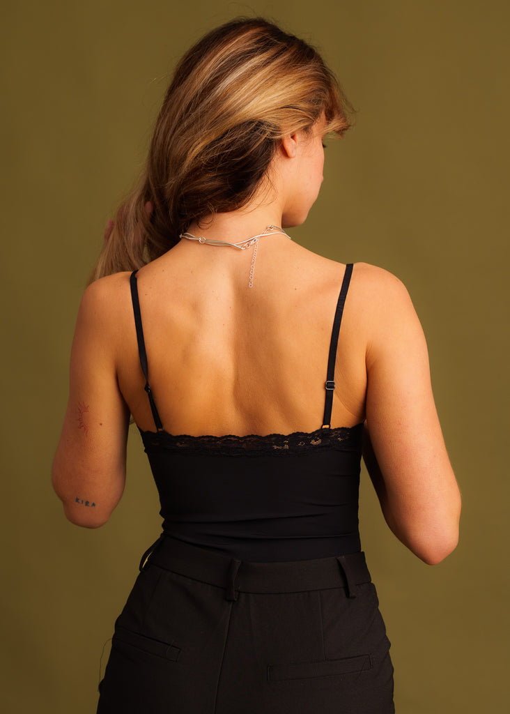 Fränze Bodysuit — Black bodysuit with lace, on model — MYFASHIONFRUIT