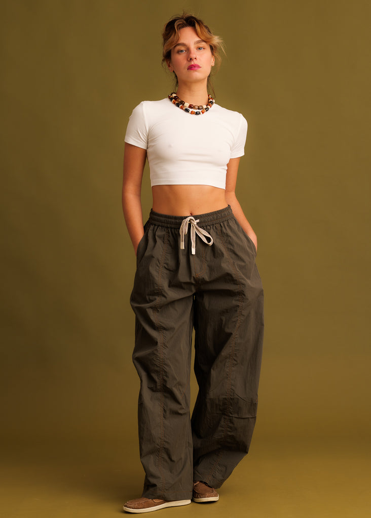 Iggy Pants — Olive nylon pants with drawstring, on model — MYFASHIONFRUIT
