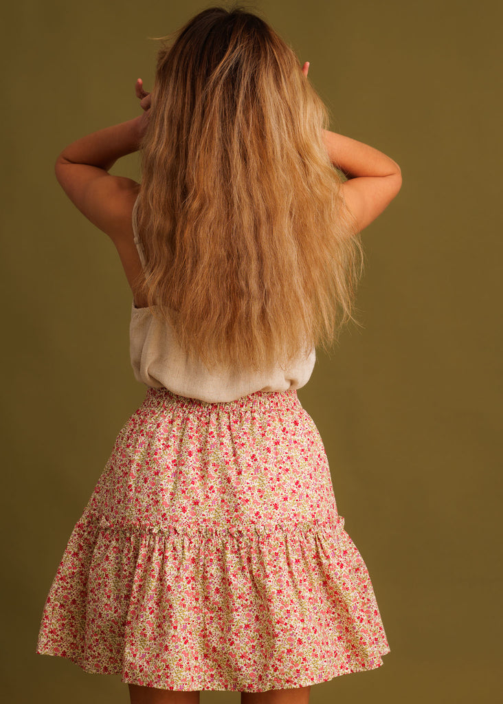 Lotta Skirt — Floral mini skirt on model, back view — MYFASHIONFRUIT