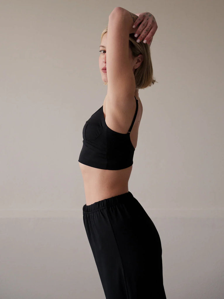 Eden Top — Black top on model, side view — MYFASHIONFRUIT