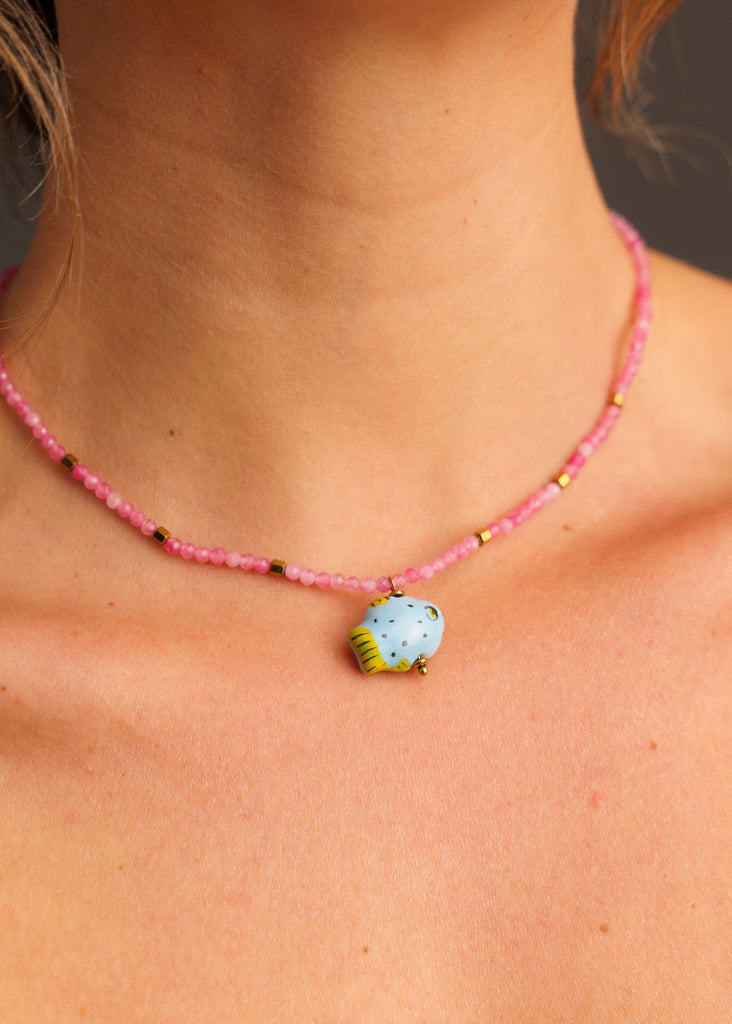Asherah Necklace — Pink beaded necklace with fish pendant on model — MYFASHIONFRUIT
