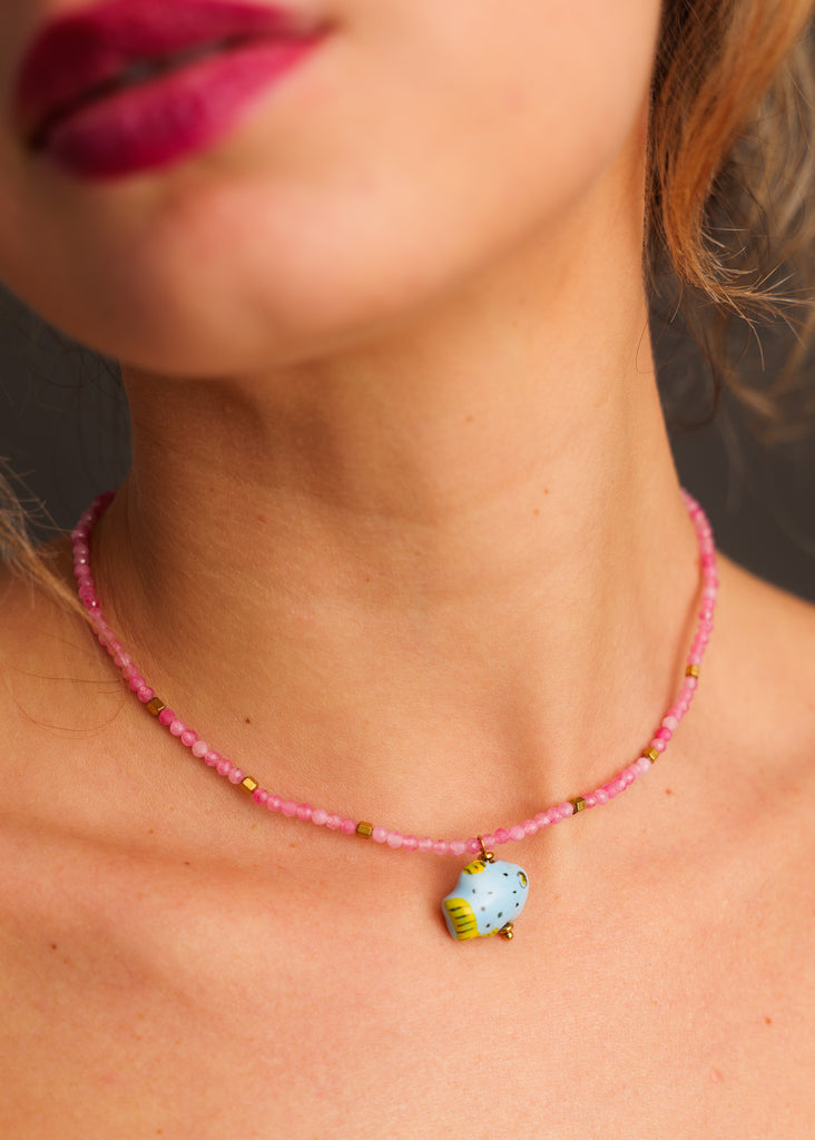 Asherah Necklace — Pink beaded necklace with blue pendant, on model — MYFASHIONFRUIT