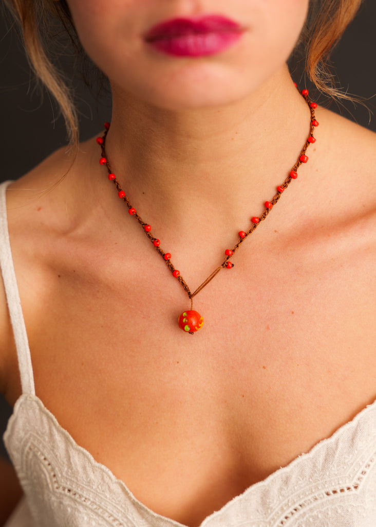 Nirvana Necklet — Red beaded necklace with pendant on model — MYFASHIONFRUIT