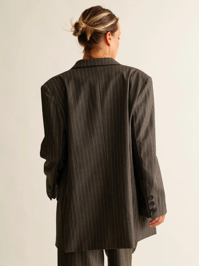 Vy Blazer — Pinstripe oversize blazer on model, back view — MYFASHIONFRUIT