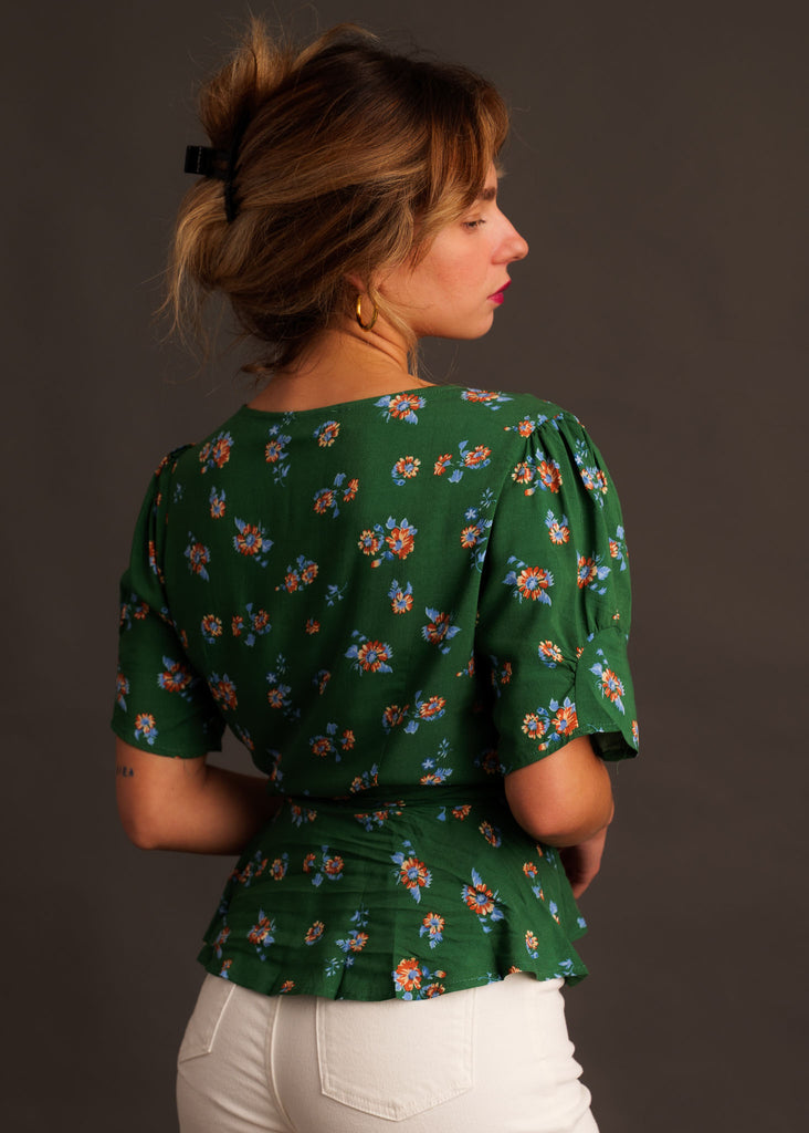 Mazzi Wrap Top — Green floral top on model — MYFASHIONFRUIT