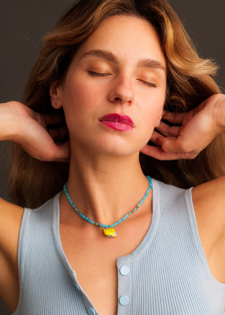 Asherah Necklace — Bead necklace with yellow pendant on model — MYFASHIONFRUIT