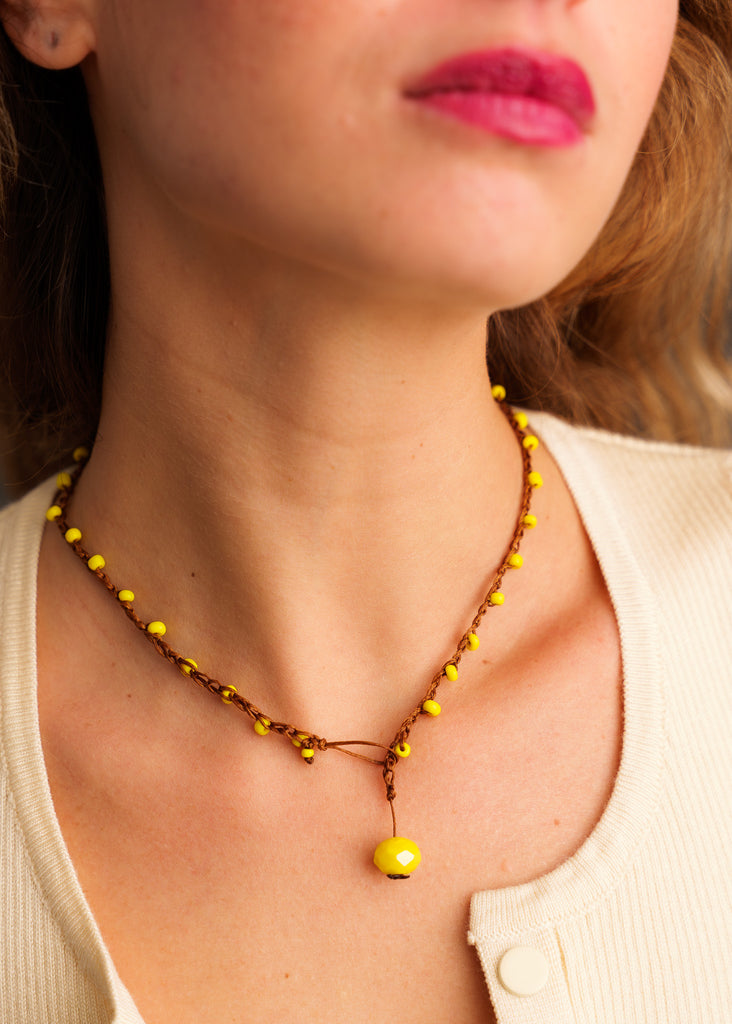 Nirvana Necklet — Brown cord, yellow bead necklace on model — MYFASHIONFRUIT