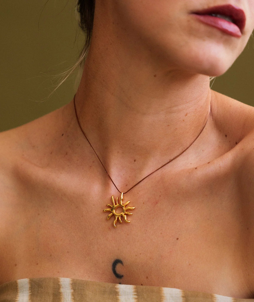 Sandya Pendant — Gold sun necklace on model — MYFASHIONFRUIT
