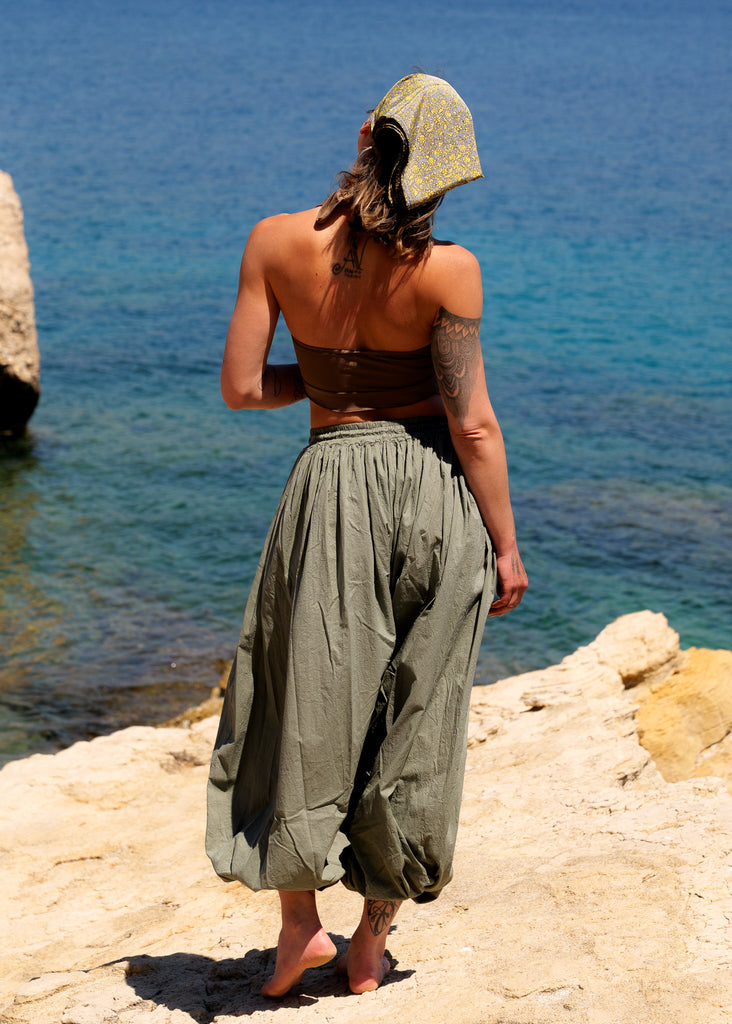 Sol Balloon Pants — olive on model, beach background — MYFASHIONFRUIT