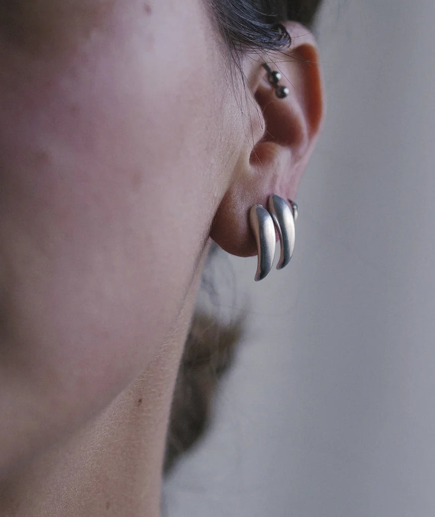 Hug Earrings — Silver earrings on model, detail — MYFASHIONFRUIT