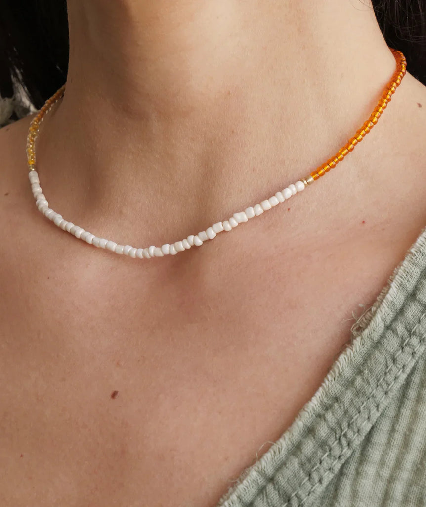 Gabby Necklace — White and orange beaded necklace on model — MYFASHIONFRUIT