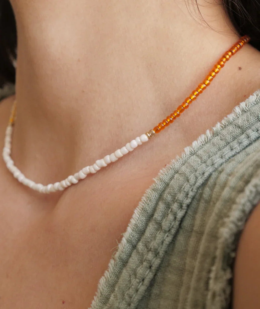 Gabby Necklace — White and orange beaded necklace on model — MYFASHIONFRUIT