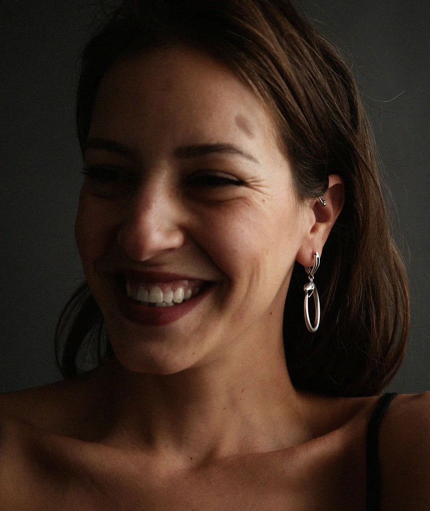 Medusa Hoops — Silver oval earrings on model — MYFASHIONFRUIT