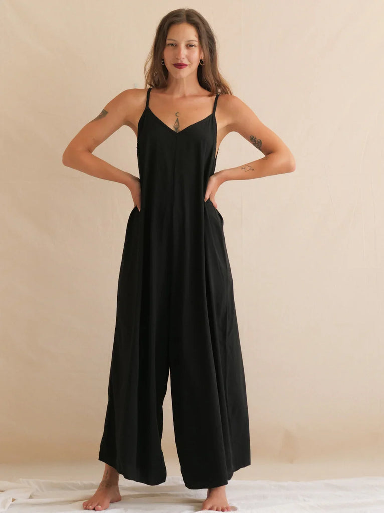 Catalina Noir Jumpsuit — Black jumpsuit on model, spaghetti straps, wide leg — MYFASHIONFRUIT