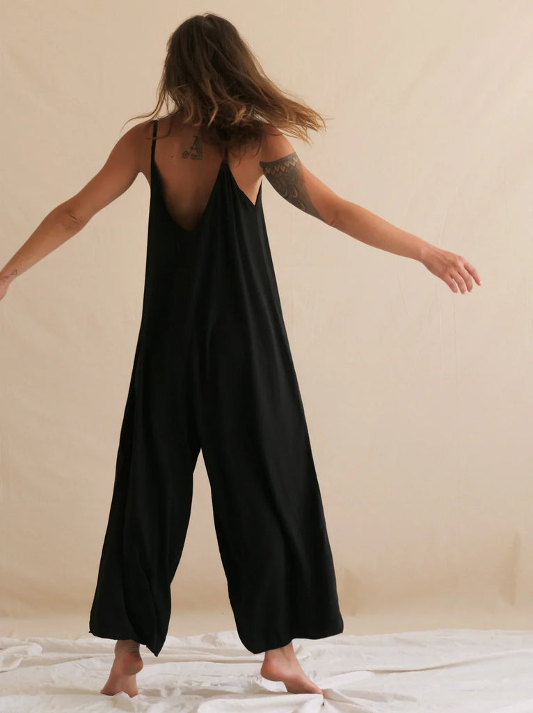 Catalina Noir Jumpsuit — Black jumpsuit with low back on model — MYFASHIONFRUIT
