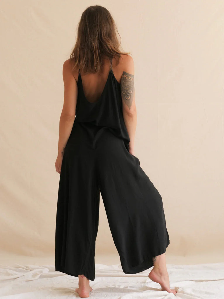 Catalina Noir Jumpsuit — Black jumpsuit on model, wide leg — MYFASHIONFRUIT