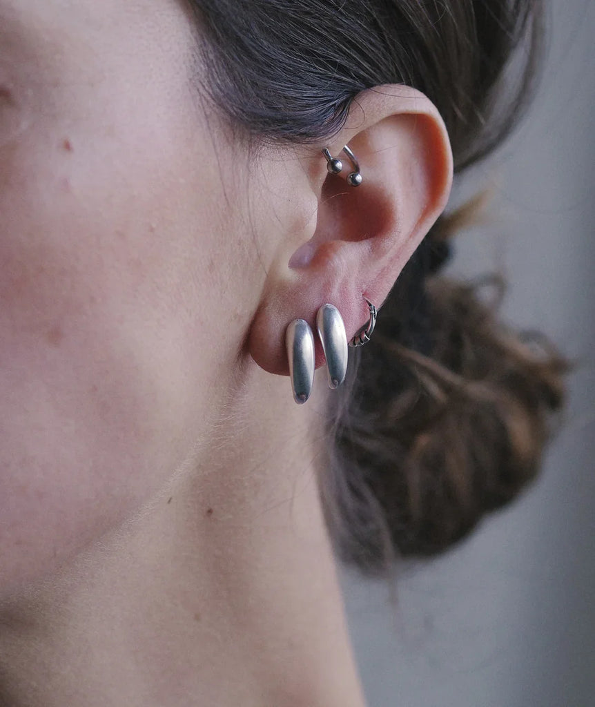 Hug Earrings — Silver on ear — MYFASHIONFRUIT