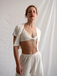 Woman wearing a white Yang Cardi, bra top and wide leg pants set — MYFASHIONFRUIT