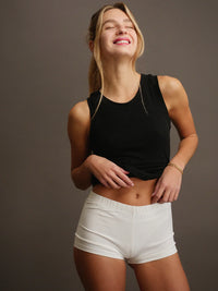 Woman wearing white Fierce Shorties and black tank top — MYFASHIONFRUIT