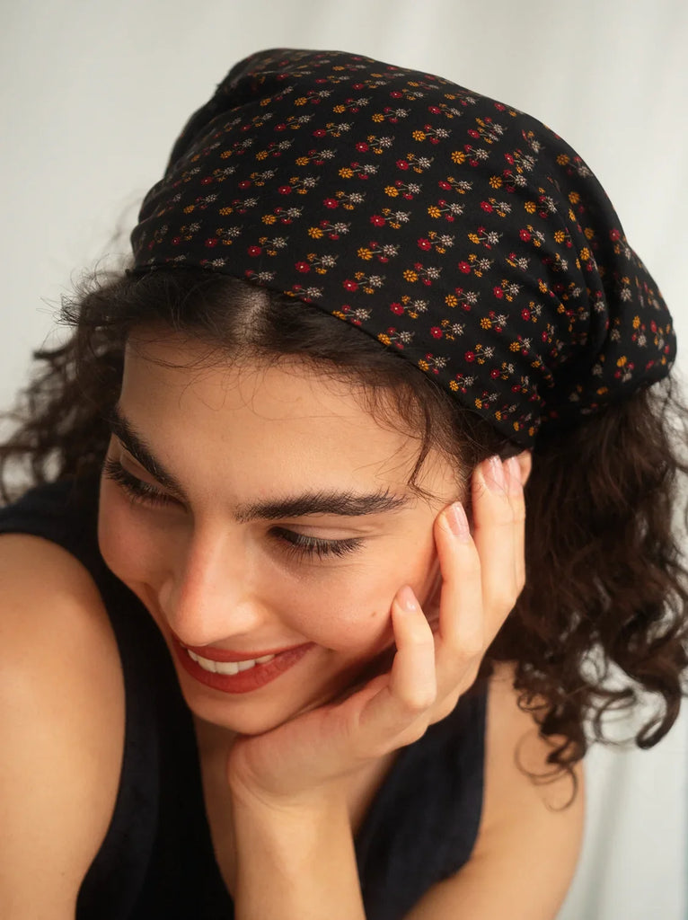 Woman wearing black Silk & Colorful Scarf with red and yellow floral print — MYFASHIONFRUIT