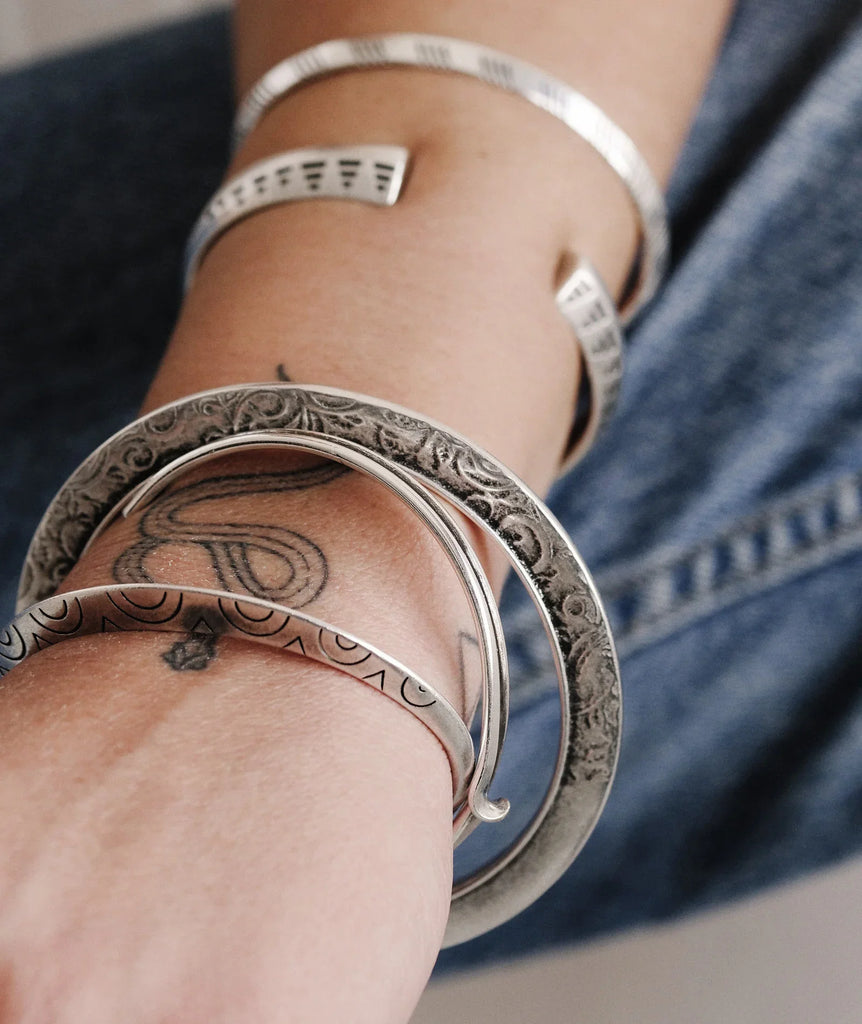 Loop Bracelet — Silver bracelets on arm, detail — MYFASHIONFRUIT