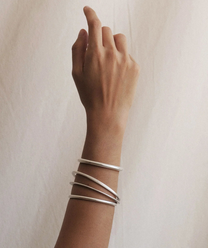 Lu Bracelet — Silver bangles on wrist — MYFASHIONFRUIT