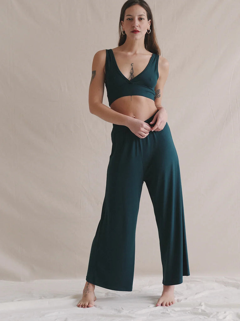 Woman wearing Tender Pants — green soft-touch high-rise pants with relaxed fit — MYFASHIONFRUIT