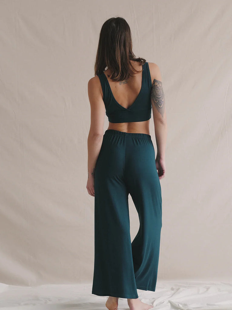 Woman wearing Tender Pants in green, loose fit — MYFASHIONFRUIT