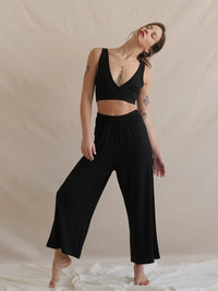 Woman wearing black Tender Pants and matching top — MYFASHIONFRUIT
