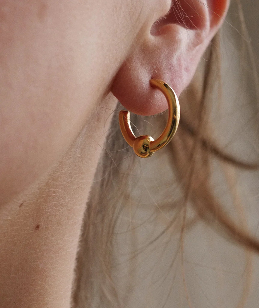 Peg Hoops — Gold knot detail on ear — MYFASHIONFRUIT