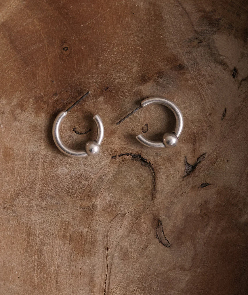 Peg Hoops — Silver hoops on wood — MYFASHIONFRUIT