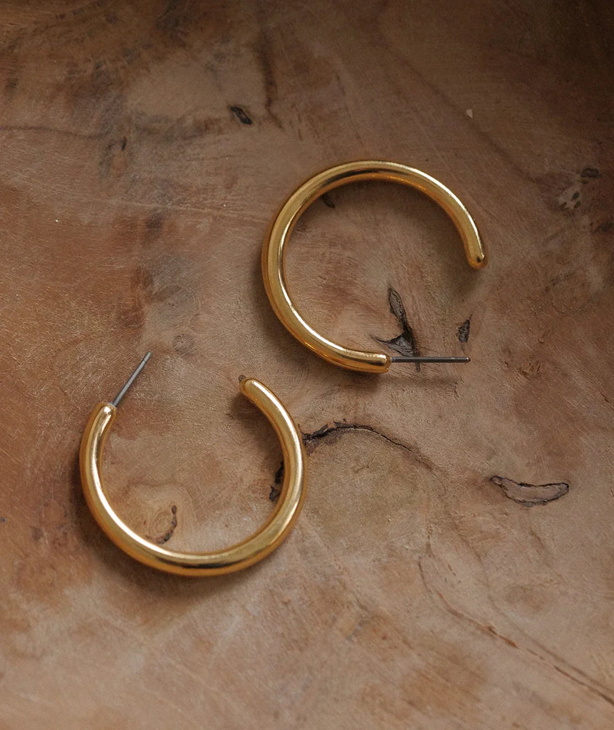 Susie Hoops — Gold, close-up on wood — MYFASHIONFRUIT
