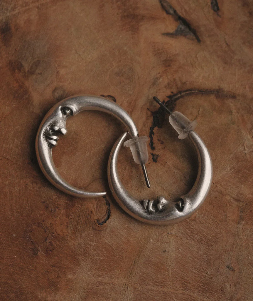 Cynthia Hoops — Silver moon earrings on wood — MYFASHIONFRUIT