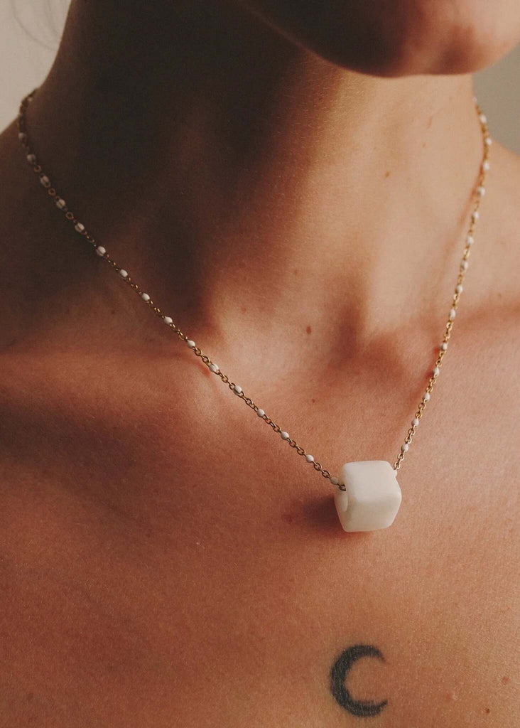 Fanni Necklace — Gold chain necklace with white cube on model — MYFASHIONFRUIT