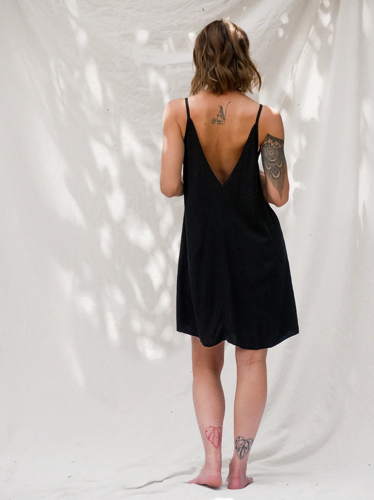 Coladas Dress — Black slip dress on model with low back detail — MYFASHIONFRUIT